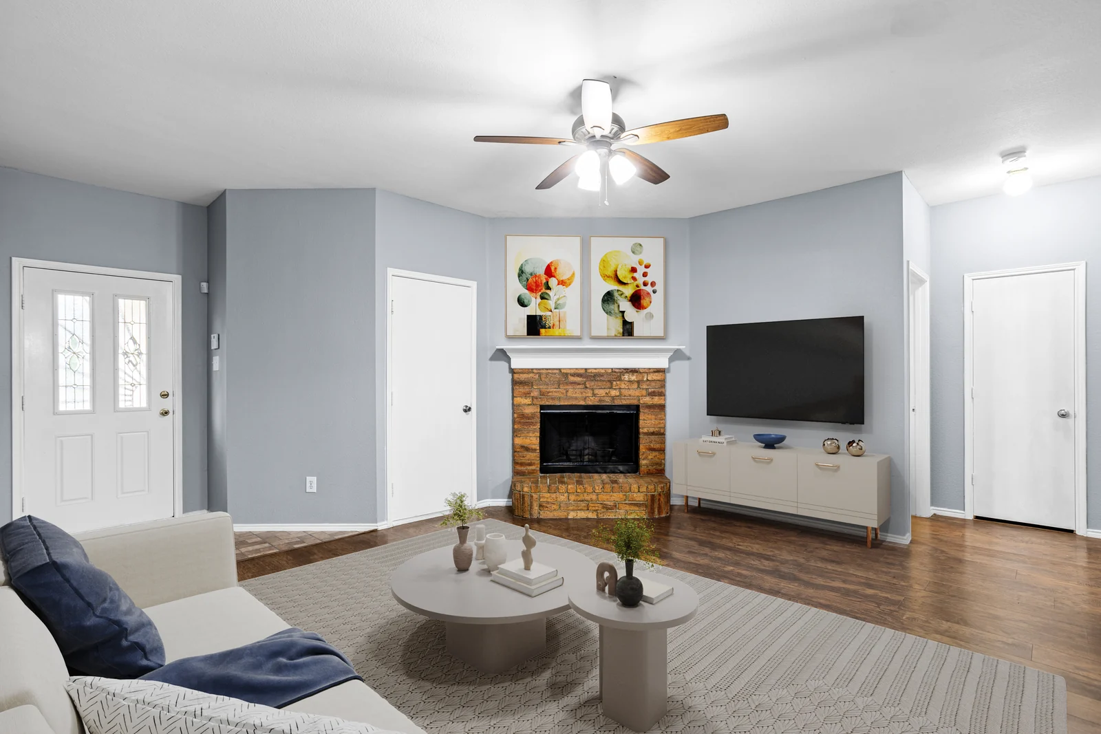 Living-room view at 1256 Cleardale Drive with the fireplace and front door